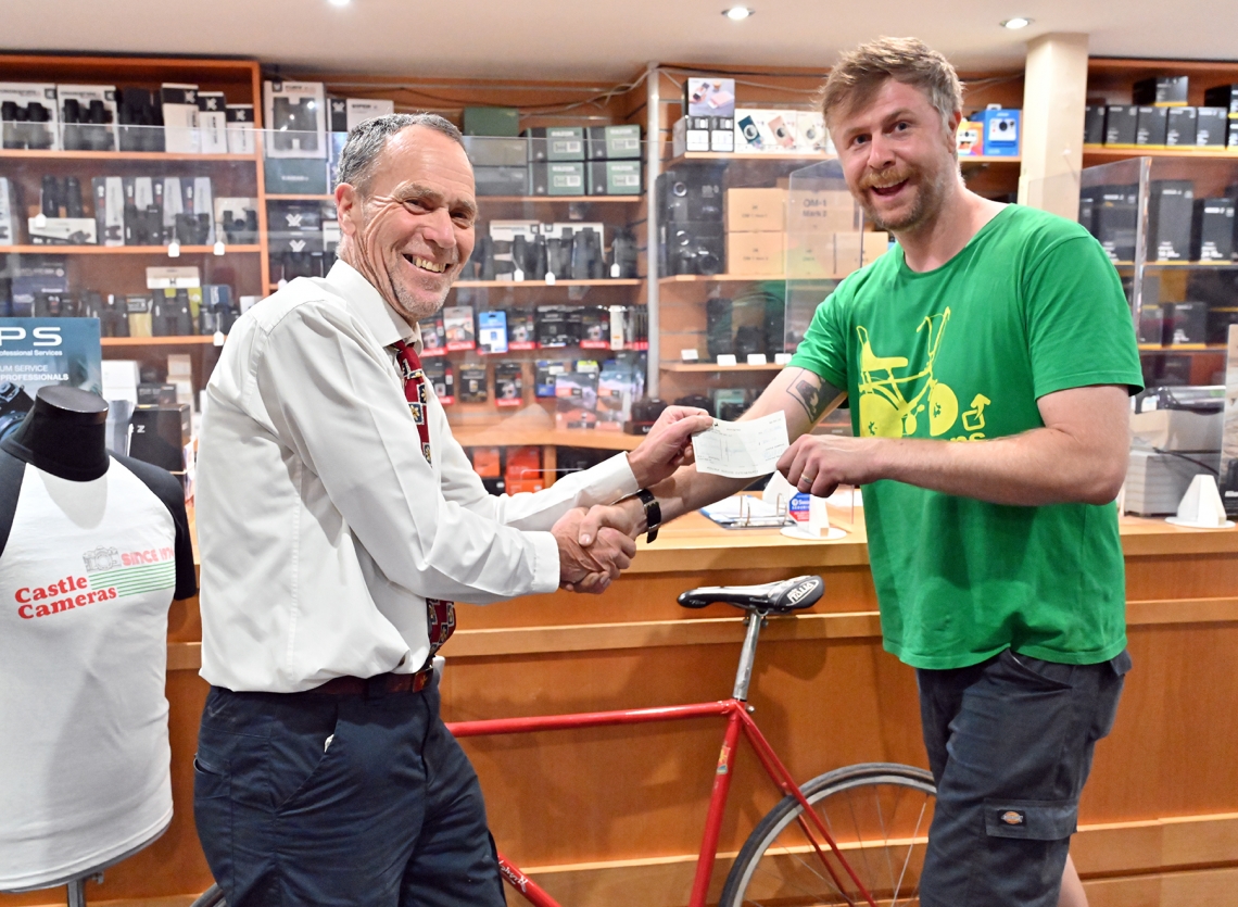 Brian presenting Hugh from Sustrans with our £250 donation 